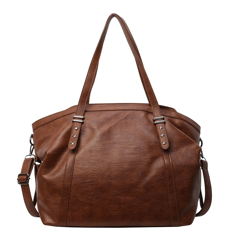 Women's Soft Surface Fashionable Texture Large Capacity Solid Handbags