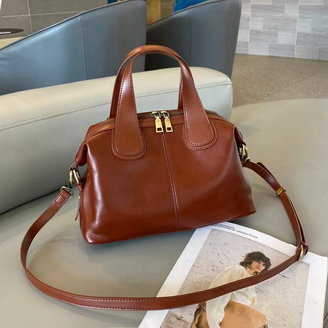Women's Large Capacity Genuine Leather Dumpling Texture Vegetable Tanned Oil Handbags