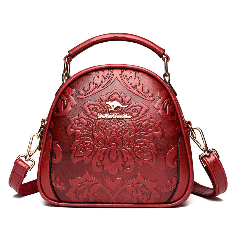 Women's Niche High Sense Round Embossed Mom Handbags