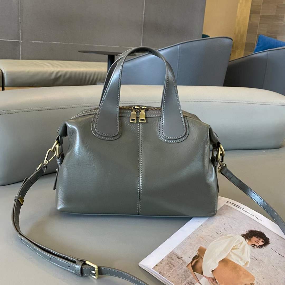 Women's Large Capacity Genuine Leather Dumpling Texture Vegetable Tanned Oil Handbags