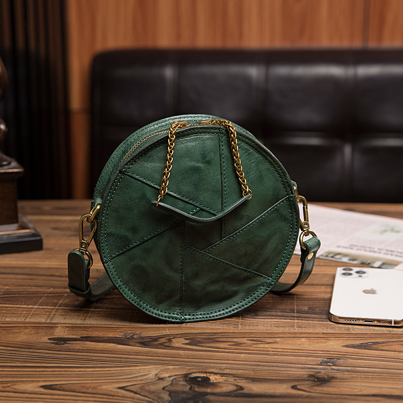 Women's Vegetable Tanned Leather Cow Hand Grip Pattern Round Vintage Bags
