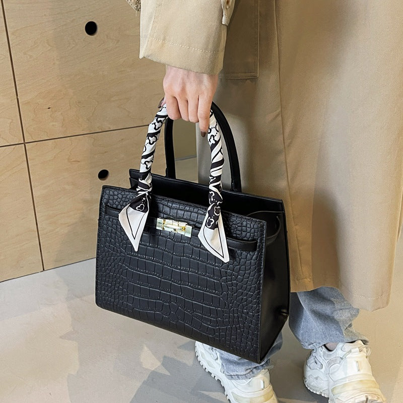 Women's Spring Stone Pattern Solid Color Simple Retro Handbags
