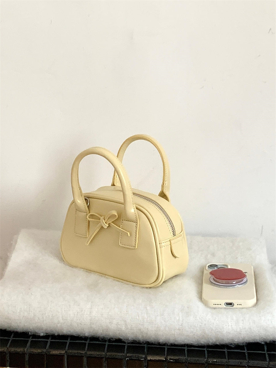 Women's Bow Shaping Fashion Hand Carrying Saddle Handbags