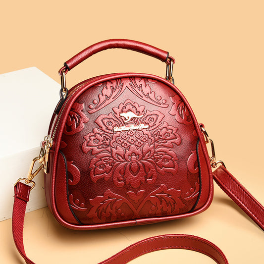 Women's Niche High Sense Round Embossed Mom Handbags