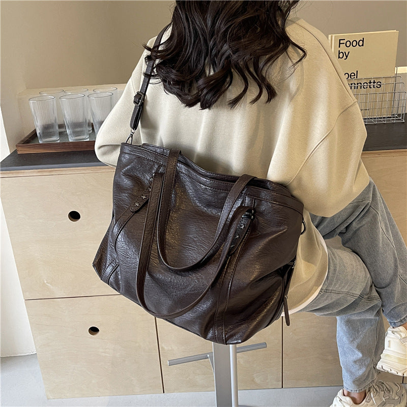 Women's Soft Surface Fashionable Texture Large Capacity Solid Handbags