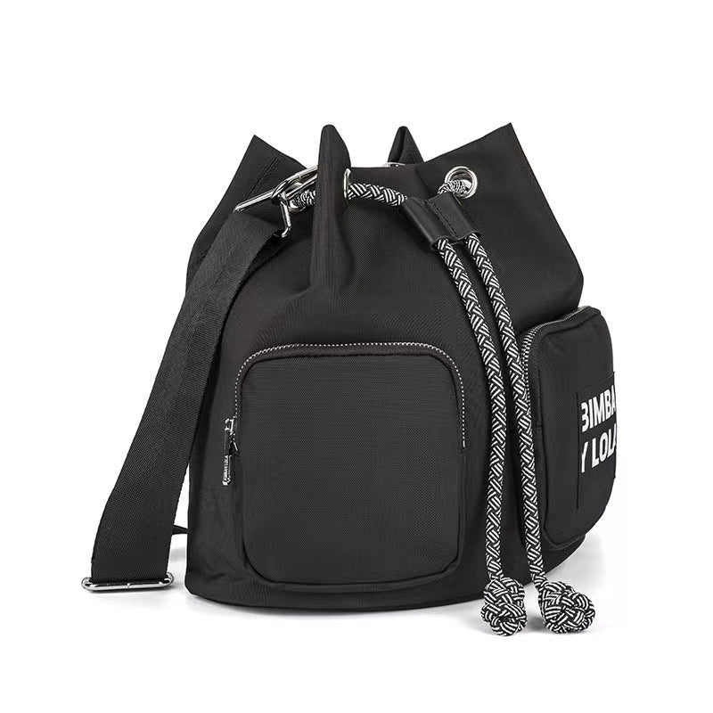 Spanish Lola Spring Diagonal Versatile Letter Backpacks