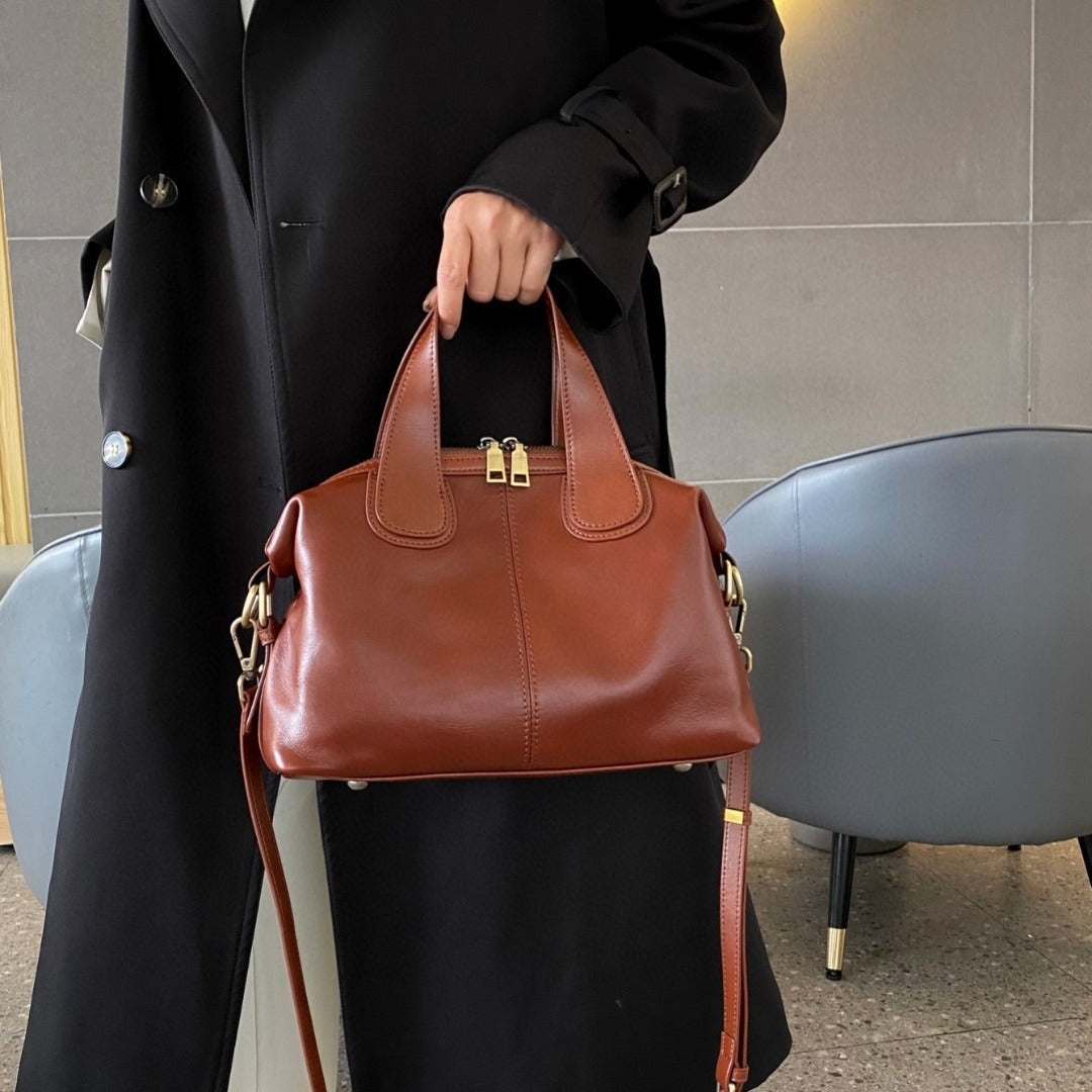 Women's Large Capacity Genuine Leather Dumpling Texture Vegetable Tanned Oil Handbags