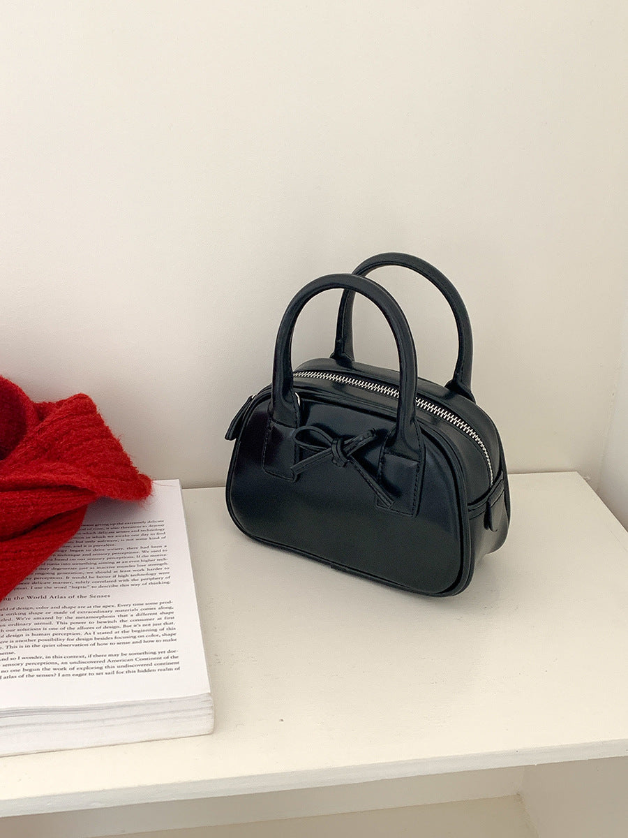 Women's Bow Shaping Fashion Hand Carrying Saddle Handbags