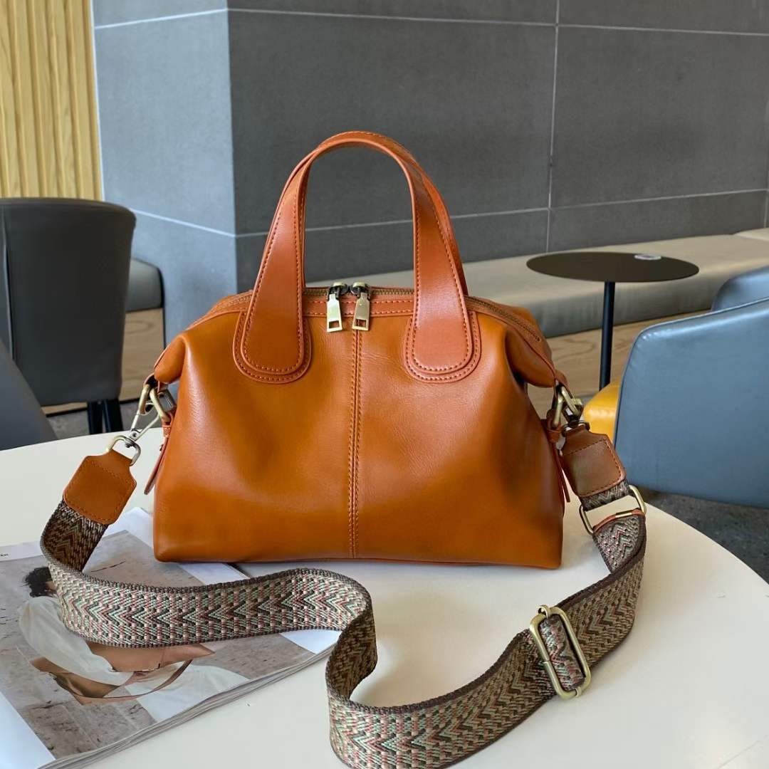 Women's Large Capacity Genuine Leather Dumpling Texture Vegetable Tanned Oil Handbags