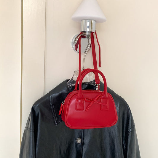 Women's Bow Shaping Fashion Hand Carrying Saddle Handbags