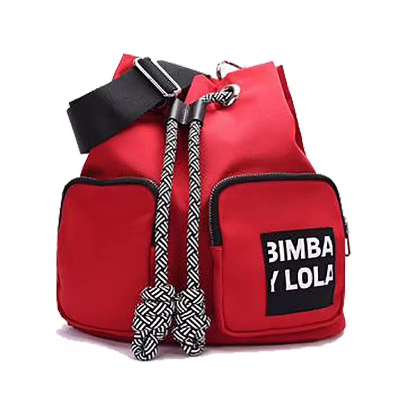 Spanish Lola Spring Diagonal Versatile Letter Backpacks