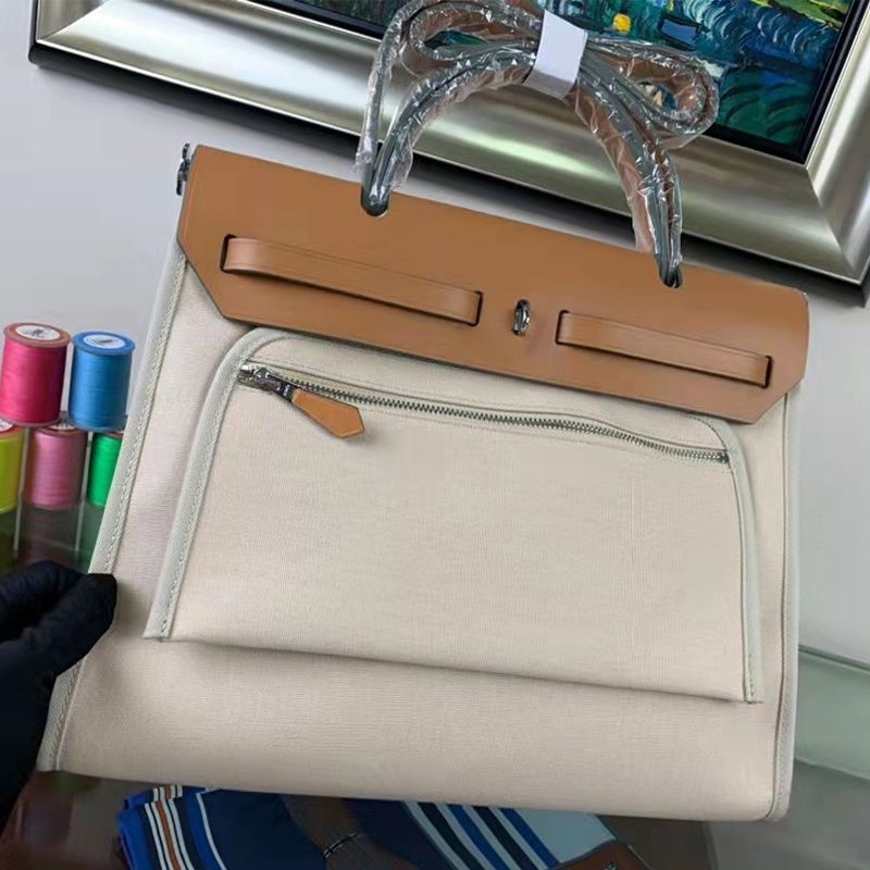Cowhide Leather Hand Carrying Son Mother Women's Handbag