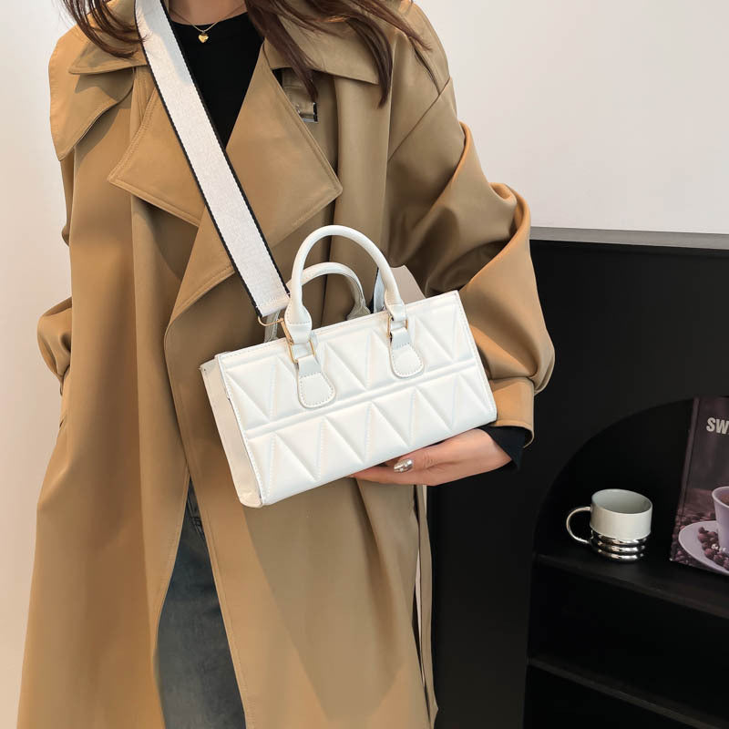 Women's Western Style Large Capacity Triangle Texture Indentation Solid Color Retro Shoulder Bags