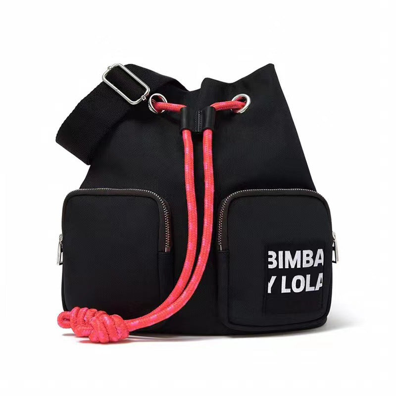 Spanish Lola Spring Diagonal Versatile Letter Backpacks
