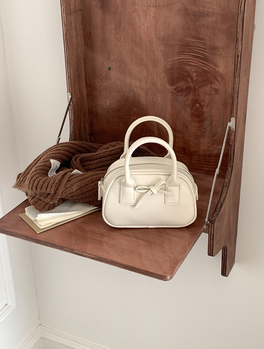 Women's Bow Shaping Fashion Hand Carrying Saddle Handbags