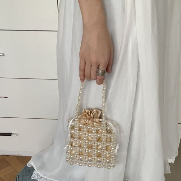 Gate Material Handmade Woven Hollowed Beaded Handbags