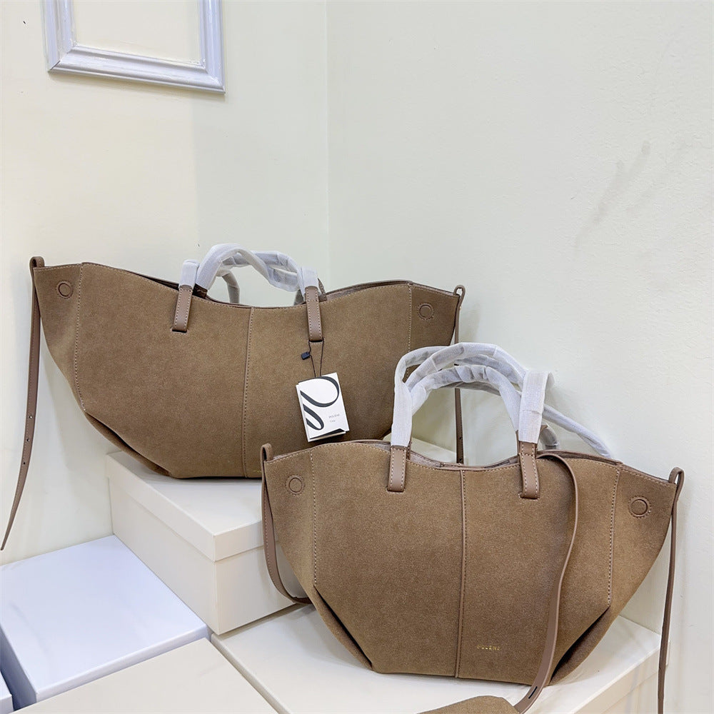 Pauline Matte Leather Wings Style Barrel Bags