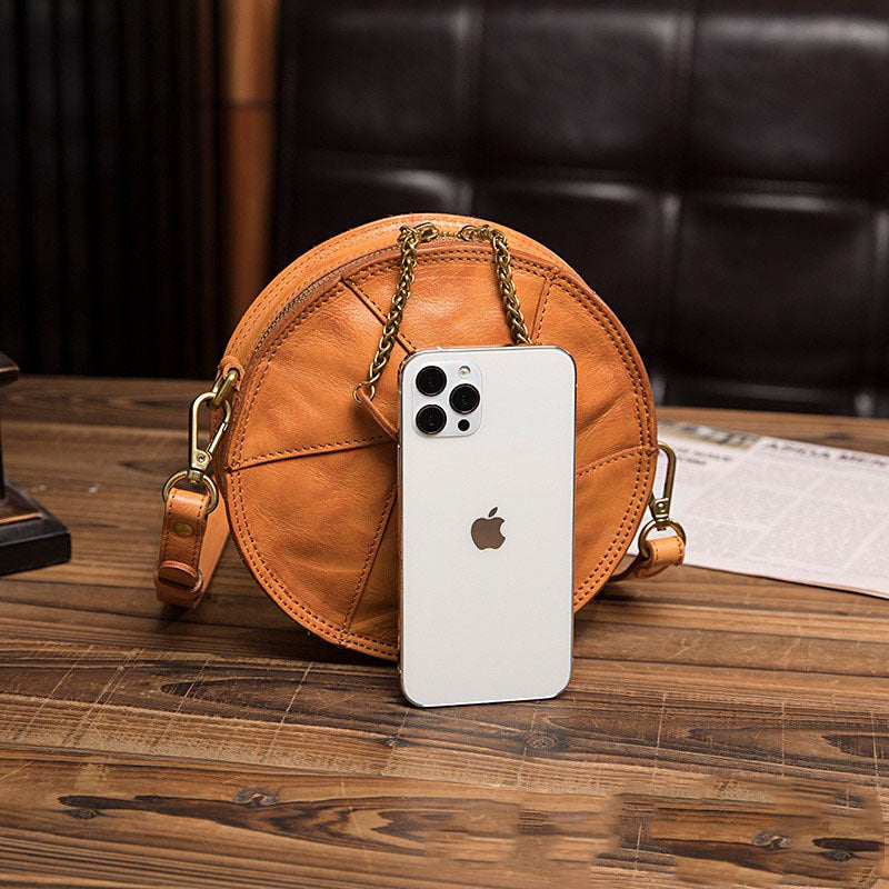 Women's Vegetable Tanned Leather Cow Hand Grip Pattern Round Vintage Bags