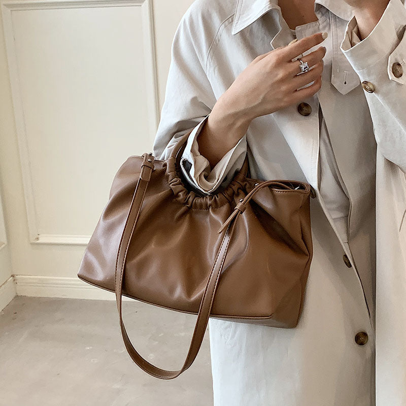 Women's Large Capacity Early Spring Retro Simple Solid Color Bags