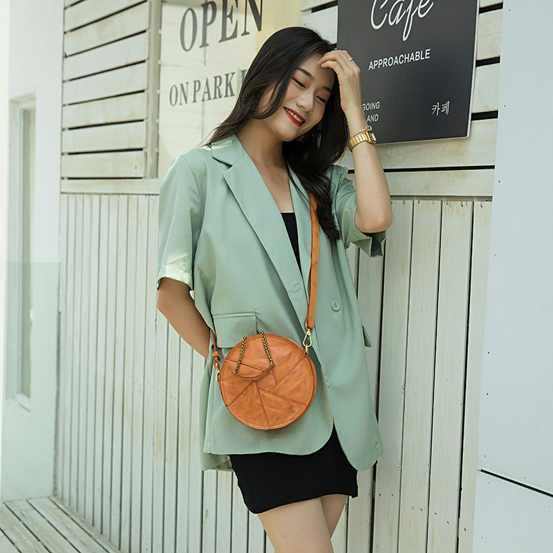 Women's Vegetable Tanned Leather Cow Hand Grip Pattern Round Vintage Bags