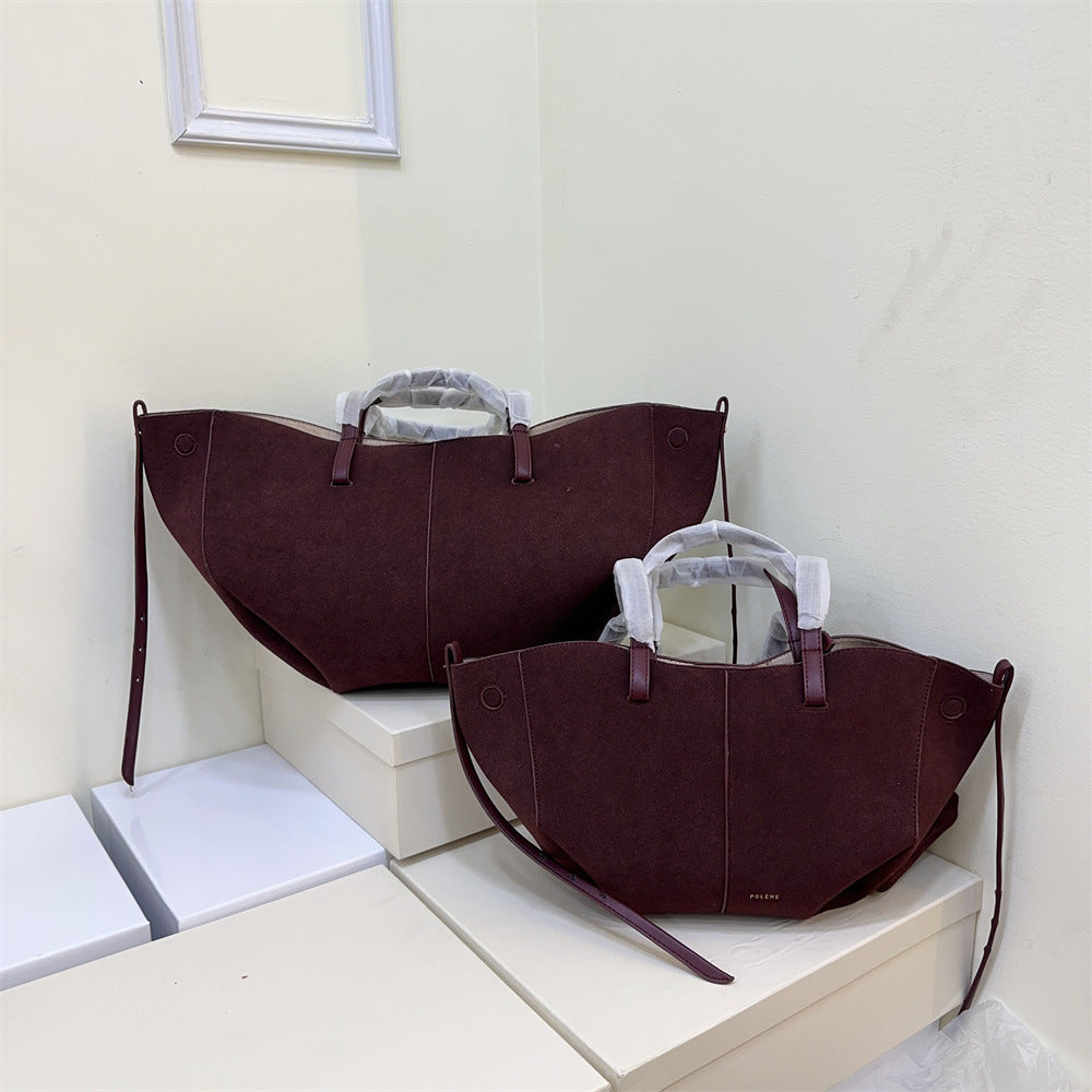 Pauline Matte Leather Wings Style Barrel Bags