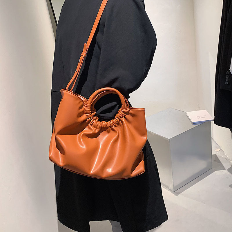 Women's Large Capacity Early Spring Retro Simple Solid Color Bags