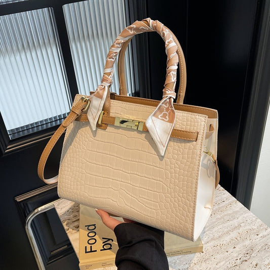 Women's Spring Stone Pattern Solid Color Simple Retro Handbags