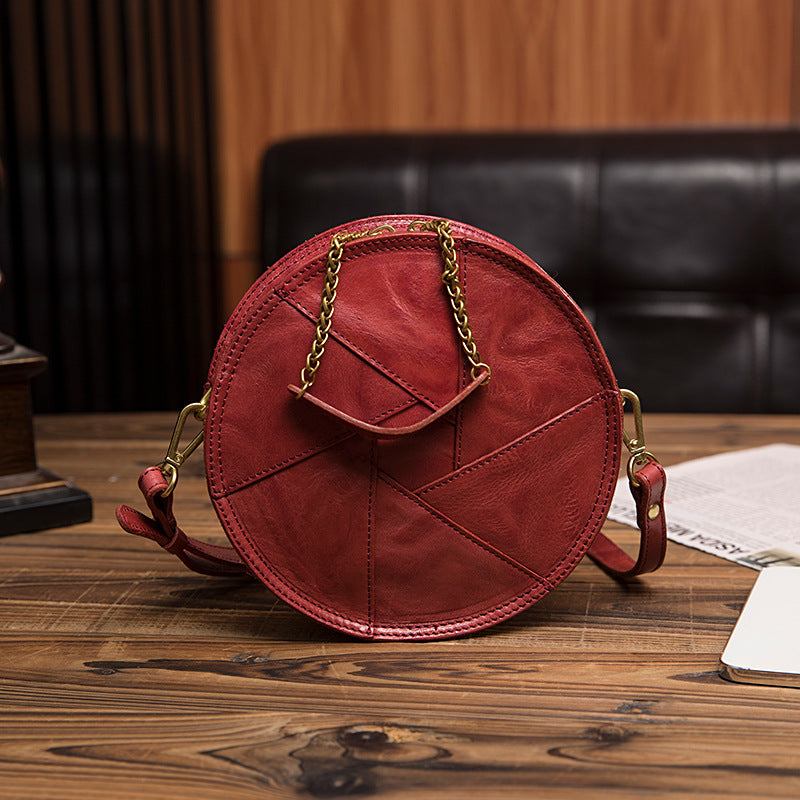 Women's Vegetable Tanned Leather Cow Hand Grip Pattern Round Vintage Bags