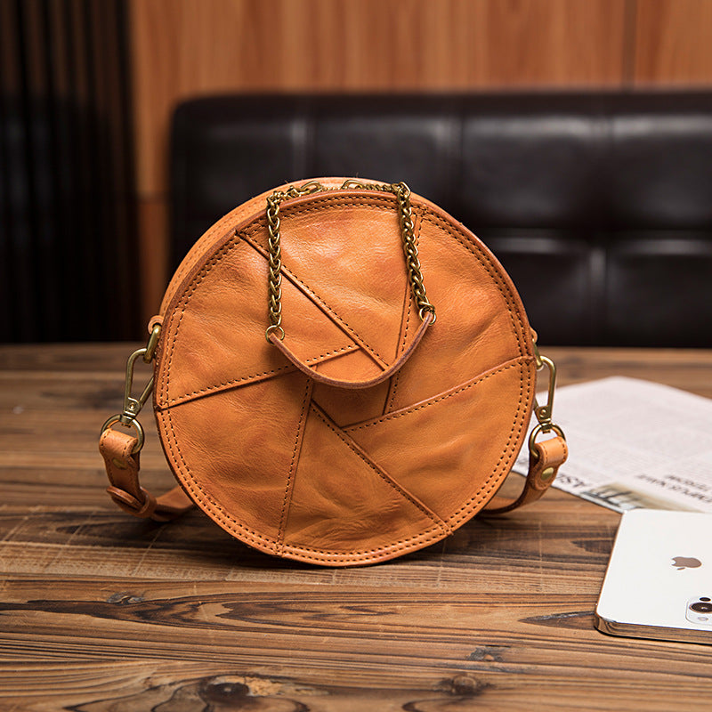 Women's Vegetable Tanned Leather Cow Hand Grip Pattern Round Vintage Bags
