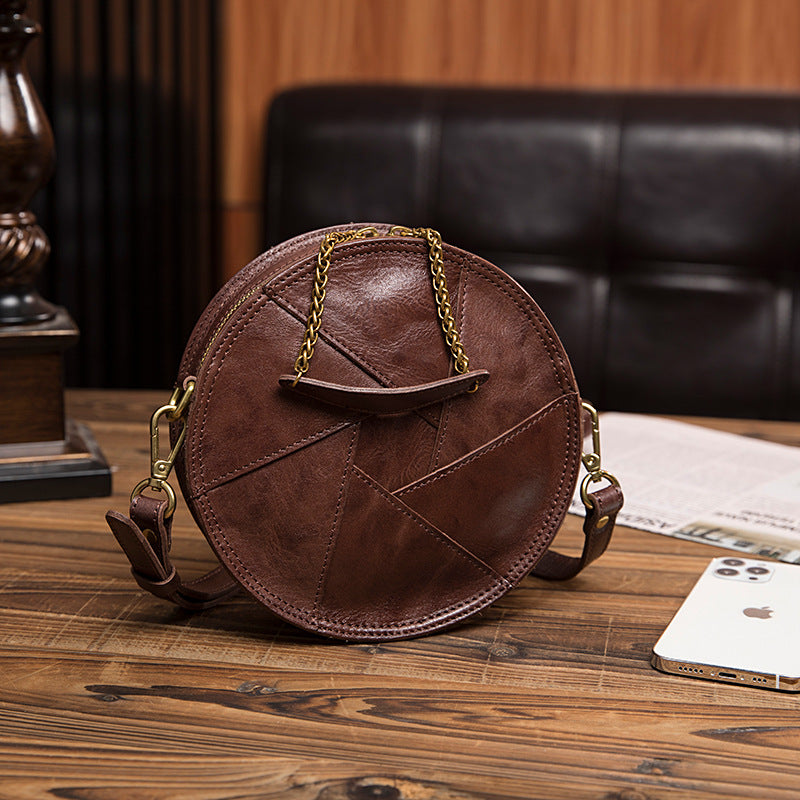 Women's Vegetable Tanned Leather Cow Hand Grip Pattern Round Vintage Bags