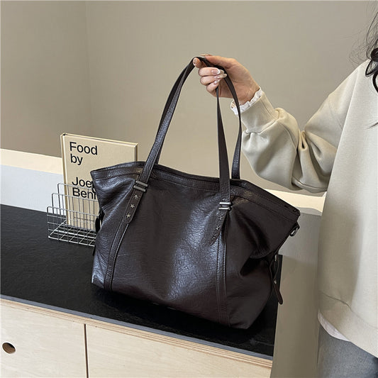 Women's Soft Surface Fashionable Texture Large Capacity Solid Handbags